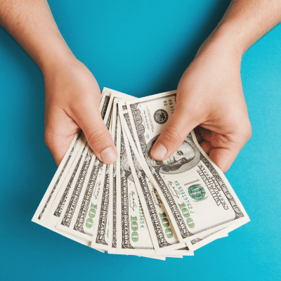 Photo of hands fanning out money